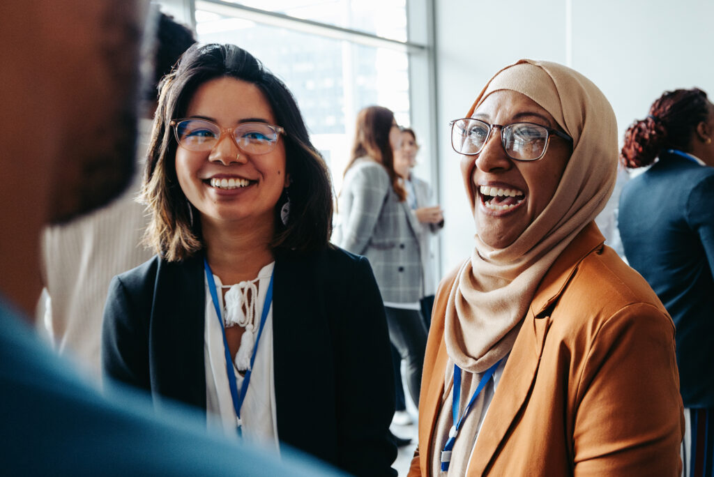 Two women smiling and laughing