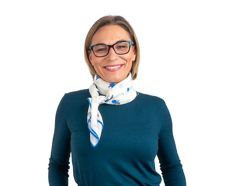 Woman with glasses smiling.